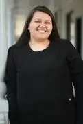 Smiling patient in a black top