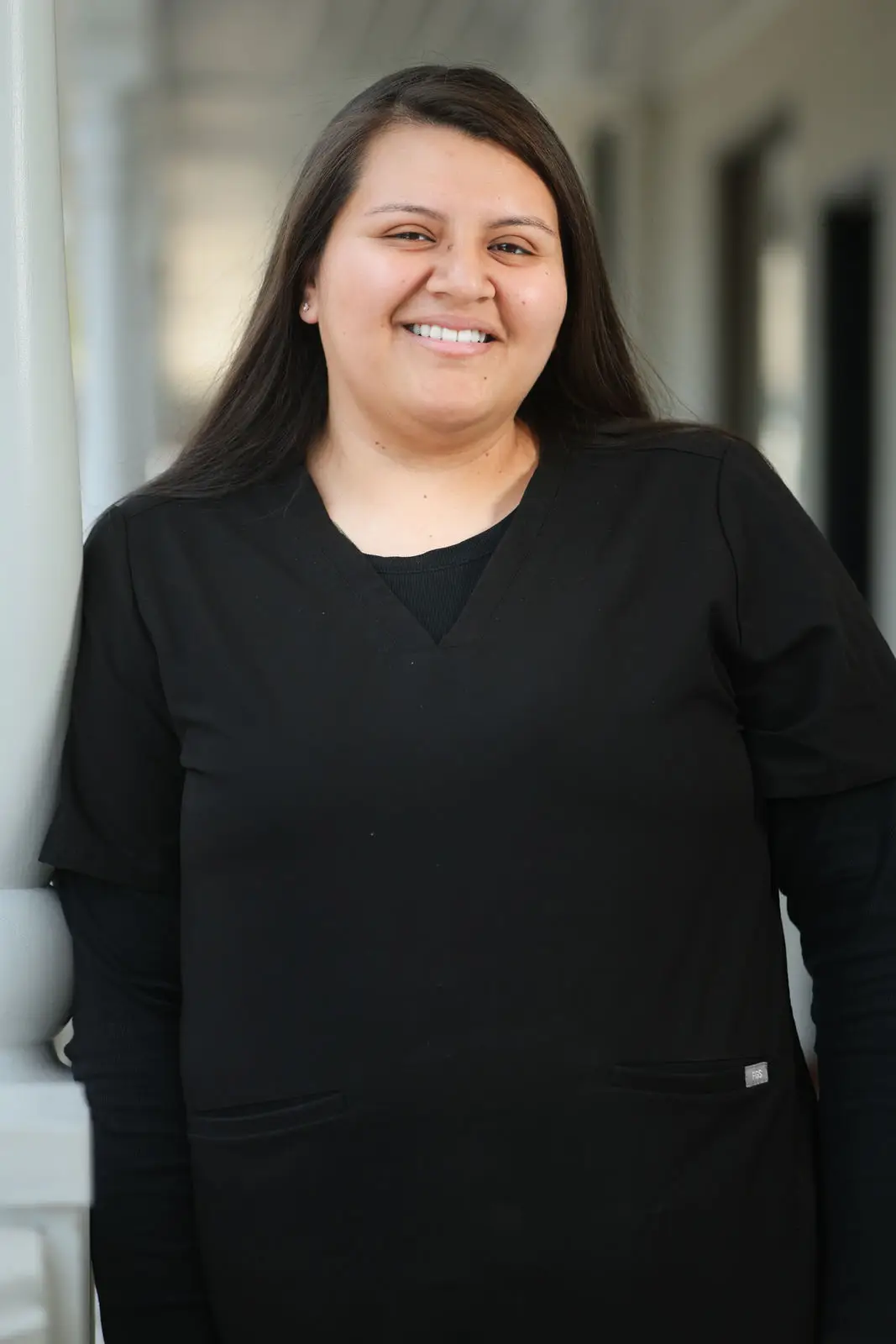 A member of the Glo Dental Studio team