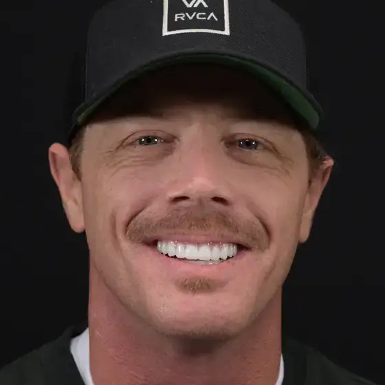 Patient smiling with a new full set of teeth